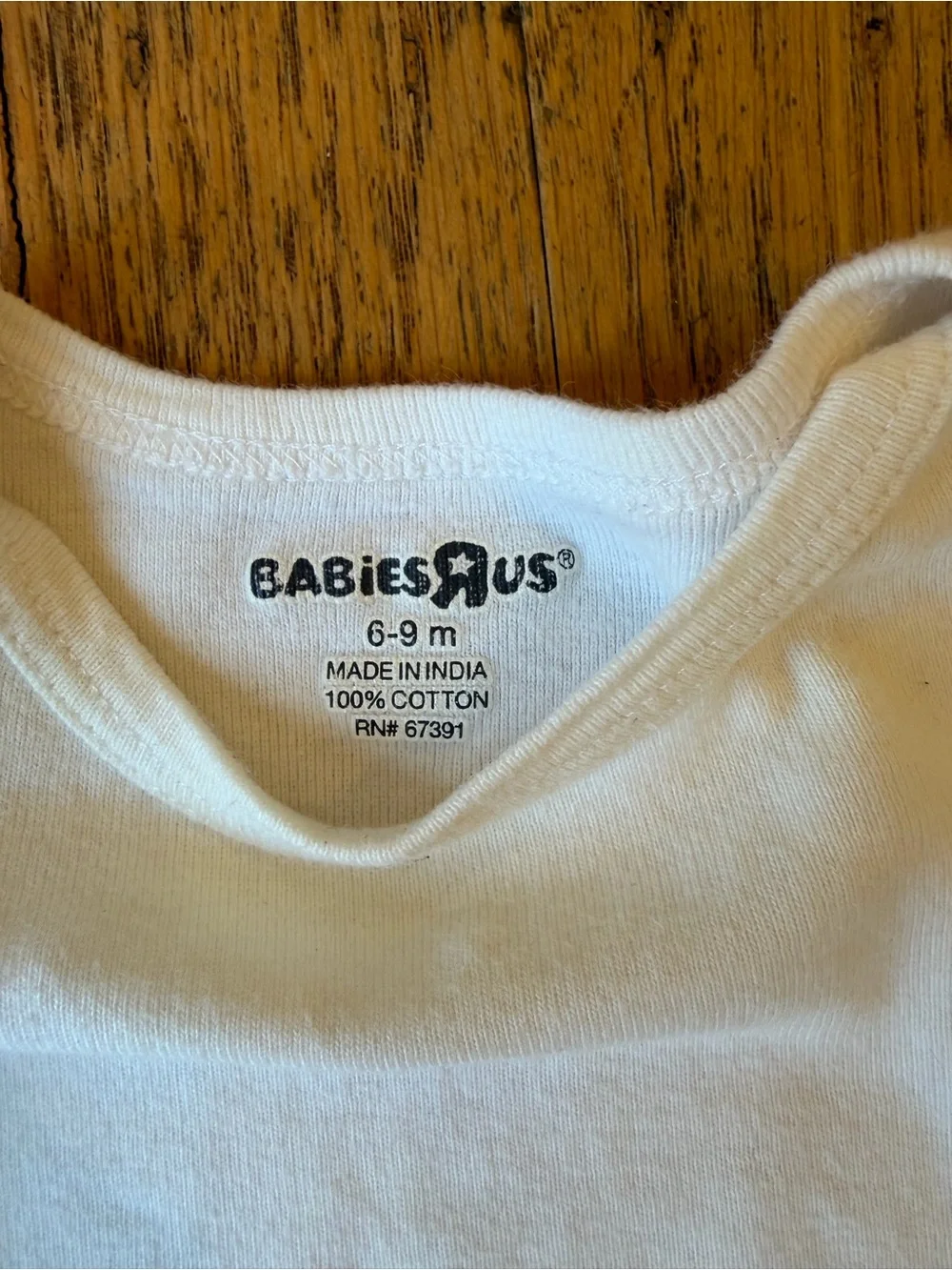 BabiesRUs White Long-Sleeve Cotton Bodysuit with Snap Closure